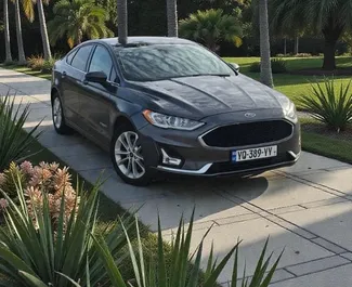 Ford Fusion Sedan 2018 disponibile per il noleggio a Batumi, con limite di chilometraggio di illimitato.