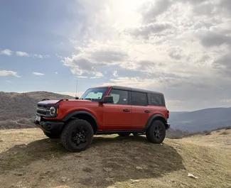 Vista frontale di un noleggio Ford Bronco a Tbilisi, Georgia ✓ Auto #15428. ✓ Cambio Automatico TM ✓ 0 recensioni.