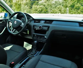 Noleggio Skoda Rapid. Auto Economica, Comfort per il noleggio in Ungheria ✓ Cauzione di Deposito di 600 EUR ✓ Opzioni assicurative RCT, CDW, FDW, All'estero.