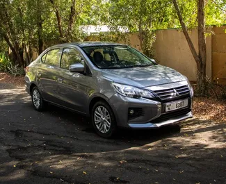 Noleggio Mitsubishi Attrage. Auto Economica per il noleggio negli Emirati Arabi Uniti ✓ Cauzione di Deposito di 1500 AED ✓ Opzioni assicurative RCT.