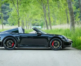 Porsche 911 Carrera Cabrio 2025 disponibile per il noleggio in Becici, con limite di chilometraggio di illimitato.