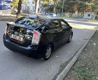 Noleggio auto Toyota Prius 2014 in Georgia, con carburante Ibrido e 168 cavalli di potenza ➤ A partire da 120 GEL al giorno.