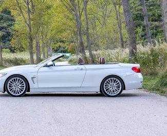 BMW 428i Cabrio 2019 disponibile per il noleggio in Becici, con limite di chilometraggio di illimitato.