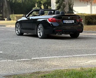 Interni di BMW 428i Cabrio in affitto in Georgia. Un'ottima auto da 4 posti con cambio Automatico.