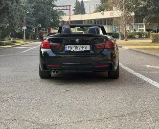 BMW 428i Cabrio 2015 disponibile per il noleggio a Tbilisi, con limite di chilometraggio di illimitato.