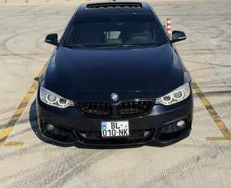 Interni di BMW 428i Gran Coupe in affitto in Georgia. Un'ottima auto da 5 posti con cambio Automatico.