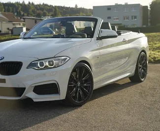 Vista frontale di un noleggio BMW 218i Cabrio a Budva, Montenegro ✓ Auto #15645. ✓ Cambio Automatico TM ✓ 0 recensioni.