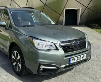 Vista frontale di un noleggio Subaru Forester a Tbilisi, Georgia ✓ Auto #15694. ✓ Cambio Automatico TM ✓ 0 recensioni.