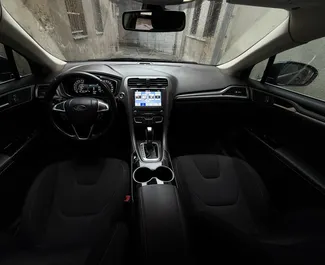 Ford Mondeo 2016 disponibile per il noleggio a Tbilisi, con limite di chilometraggio di illimitato.