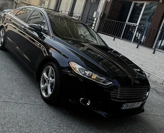 Ford Fusion Sedan 2015 disponibile per il noleggio a Tbilisi, con limite di chilometraggio di illimitato.