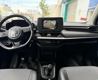 Noleggio Suzuki Swift. Auto Economica per il noleggio in Tunisia ✓ Cauzione di Deposito di 700 EUR ✓ Opzioni assicurative RCT.