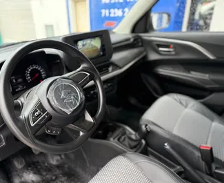 Vista frontale di un noleggio Suzuki Swift a Tunisi, Tunisia ✓ Auto #15895. ✓ Cambio Automatico TM ✓ 0 recensioni.