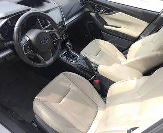 Subaru Impreza 2018 disponibile per il noleggio a Tbilisi, con limite di chilometraggio di illimitato.