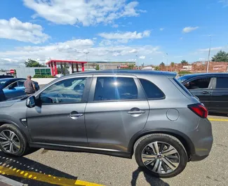 Interni di Mitsubishi Outlander Sport in affitto in Georgia. Un'ottima auto da 5 posti con cambio Automatico.
