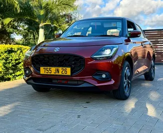 Vista frontale di un noleggio Suzuki Swift a Mauritius, Mauritius ✓ Auto #15654. ✓ Cambio Automatico TM ✓ 0 recensioni.