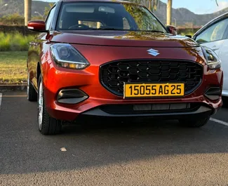Vista frontale di un noleggio Suzuki Swift a Mauritius, Mauritius ✓ Auto #15653. ✓ Cambio Automatico TM ✓ 0 recensioni.