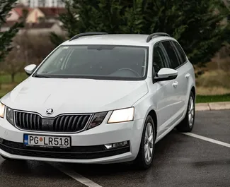 Vista frontale di un noleggio Skoda Octavia Combi a Podgorica, Montenegro ✓ Auto #9027. ✓ Cambio Automatico TM ✓ 0 recensioni.