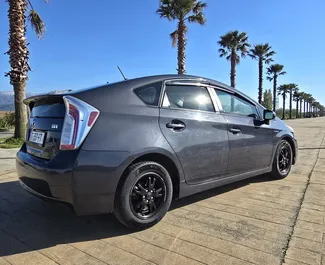 Noleggio auto Toyota Prius 2012 in Georgia, con carburante Ibrido e 122 cavalli di potenza ➤ A partire da 101 GEL al giorno.