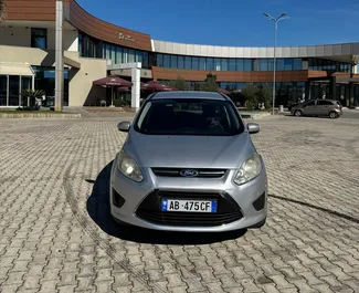 Vista frontale di un noleggio Ford C-Max Grand a Tirana, Albania ✓ Auto #16440. ✓ Cambio Manuale TM ✓ 0 recensioni.