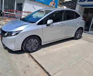 Noleggio auto Nissan Note 2024 a Cipro, con carburante Ibrido e 110 cavalli di potenza ➤ A partire da 23 EUR al giorno.