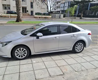 Vista frontale di un noleggio Toyota Corolla Sedan a Limassol, Cipro ✓ Auto #16352. ✓ Cambio Automatico TM ✓ 0 recensioni.