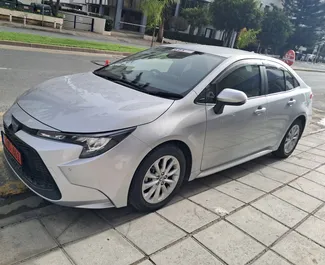 Noleggio auto Toyota Corolla Sedan 2024 a Cipro, con carburante Ibrido e 140 cavalli di potenza ➤ A partire da 30 EUR al giorno.