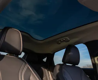 Noleggio Ford Mustang Mach E. Auto Premium, Lusso, SUV per il noleggio in Georgia ✓ Cauzione di Deposito di 560 GEL ✓ Opzioni assicurative RCT, CDW, SCDW, FDW, Passeggeri, Furto.