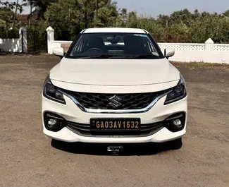 Vista frontale di un noleggio Suzuki Baleno all'aeroporto di Goa, Goa ✓ Auto #16160. ✓ Cambio Automatico TM ✓ 0 recensioni.