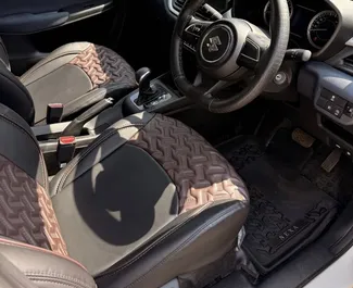 Noleggio Suzuki Baleno. Auto Economica, Comfort per il noleggio a Goa ✓ Cauzione di Deposito di 60 USD ✓ Opzioni assicurative RCT.