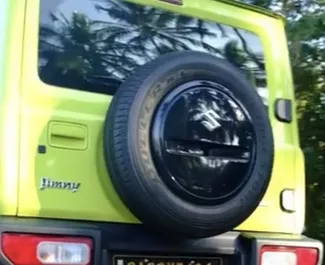 Vista frontale di un noleggio Suzuki Jimny all'aeroporto di Goa, Goa ✓ Auto #16189. ✓ Cambio Automatico TM ✓ 0 recensioni.