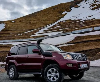Vista frontale di un noleggio Toyota Land Cruiser Prado a Bishkek, Kirghizistan ✓ Auto #16343. ✓ Cambio Automatico TM ✓ 0 recensioni.