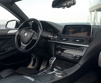 Interni di BMW 6-series Cabrio in affitto in Georgia. Un'ottima auto da 4 posti con cambio Automatico.