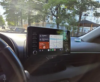 Interni di Toyota Yaris in affitto in Georgia. Un'ottima auto da 5 posti con cambio Automatico.