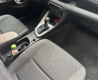 Noleggio auto Toyota Yaris 2024 in Montenegro, con carburante Ibrido e 115 cavalli di potenza ➤ A partire da 35 EUR al giorno.