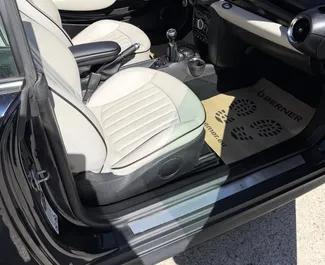 Noleggio Mini Cooper S Cabrio. Auto Comfort, Premium, Cabrio per il noleggio in Montenegro ✓ Cauzione di Senza deposito ✓ Opzioni assicurative RCT, Passeggeri, All'estero, Senza deposito.